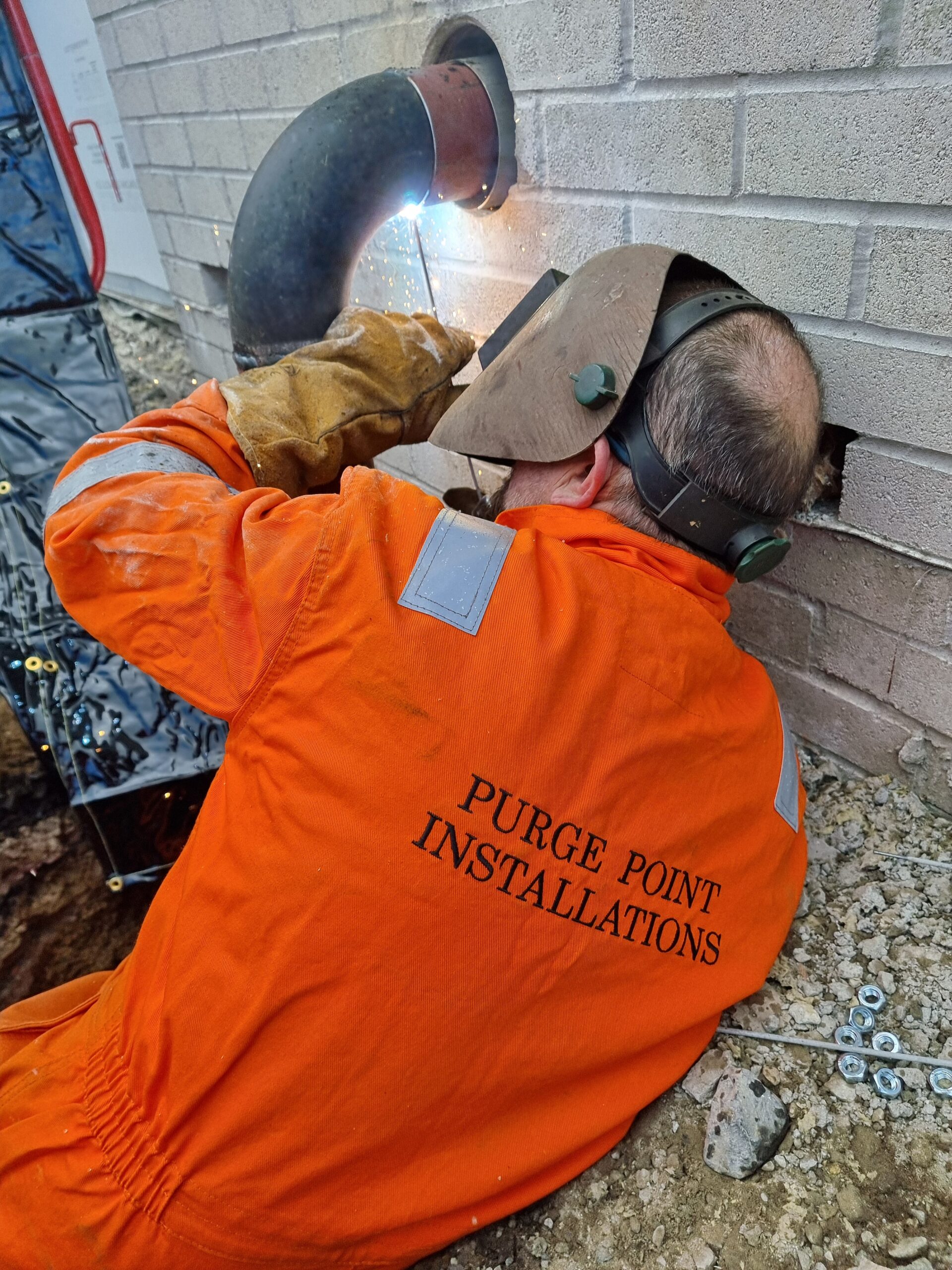 Positional welding of gas main entry, commercial gas entry