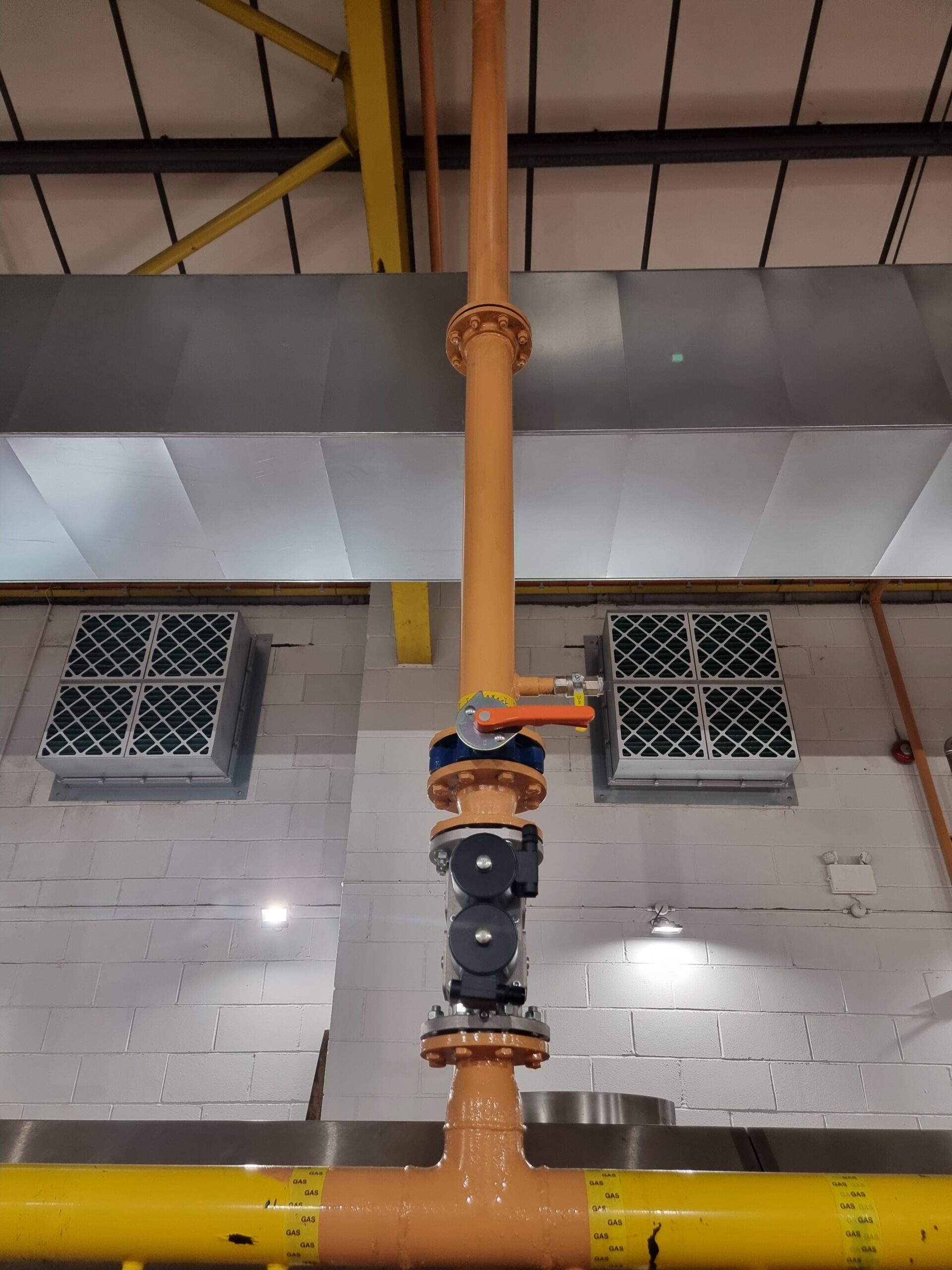Pipe work weld modifications to a gas manifold at a commercial bakery.